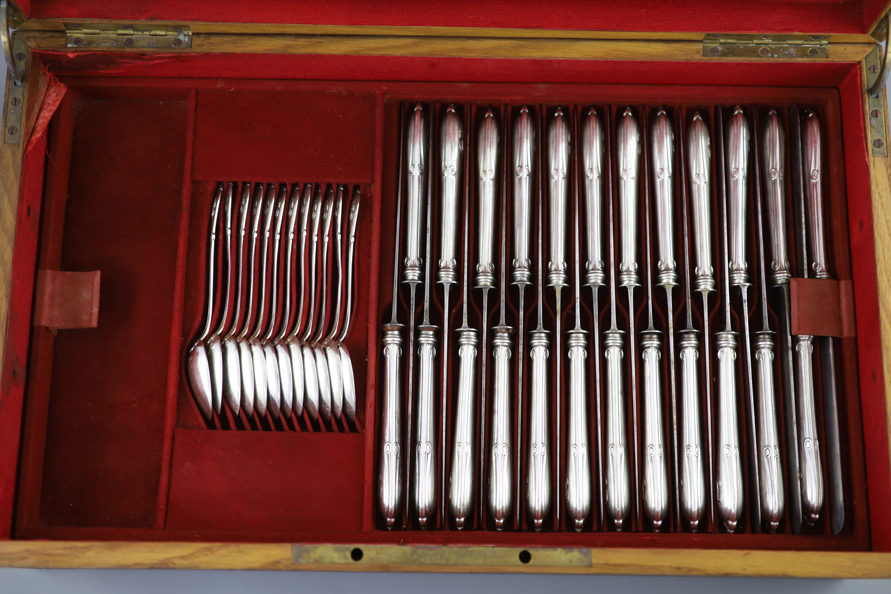 A late 19th century French canteen of silver 950 standard cutlery, in a brass mounted oak canteen, by Prevost Recipon & Cie (Maison Odiot)